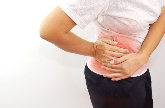 woman suffering from waist or hip pain