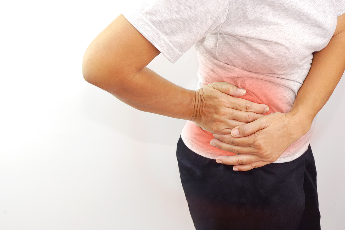 woman suffering from waist or hip pain